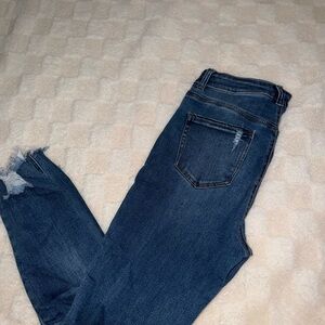 Distressed Blue Denim Jeans